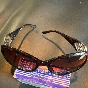 Elegant designer sunglasses for the ladies. Kept in good condition.